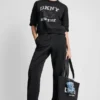 Bluza z logo DKNY 1989 z cekinami