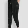 Joggersy slim fit z welurowym haftowanym logo