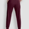 Joggersy slim fit z welurowym haftowanym logo