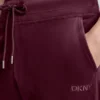 Joggersy slim fit z welurowym haftowanym logo