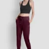 Joggersy slim fit z welurowym haftowanym logo