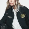Kurtka typu varsity z naszywkami i przypinkami z 1989 r.