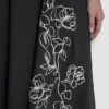 Kwiecista sukienka midi o kroju fit & flare
