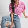 Przezroczysty sweter polo w paski