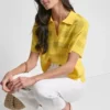 Przezroczysty sweter polo w paski