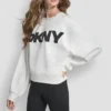 Sweter z długimi rękawami, miękkim materiałem typu scuba i logo