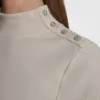 T-shirt z długim rękawem, stójką i guzikami na ramionach