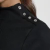 T-shirt z długim rękawem, stójką i guzikami na ramionach