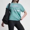 T-shirt z logo DKNY 1989 i ćwiekami